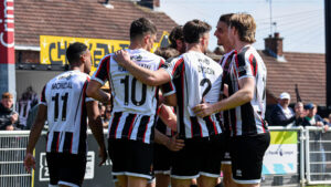 Spennymoor Town players celebrate Dan Jones' goal against Marine