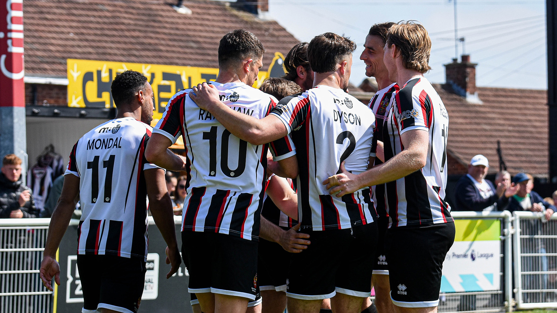 Spennymoor Town players celebrate Dan Jones' goal against Marine