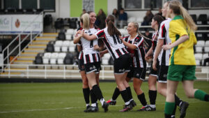 Spennymoor Town Ladies players celebrate a goal against Wallsend