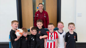 Spennymoor Town Ladies striker Holly Doogan with Mini Moors players