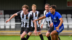 Spennymoor Town midfielder Jack Jenkins in action against FC Halifax Town
