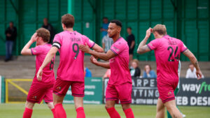 Spennymoor Town players celebrate a goal against Blyth Spartans