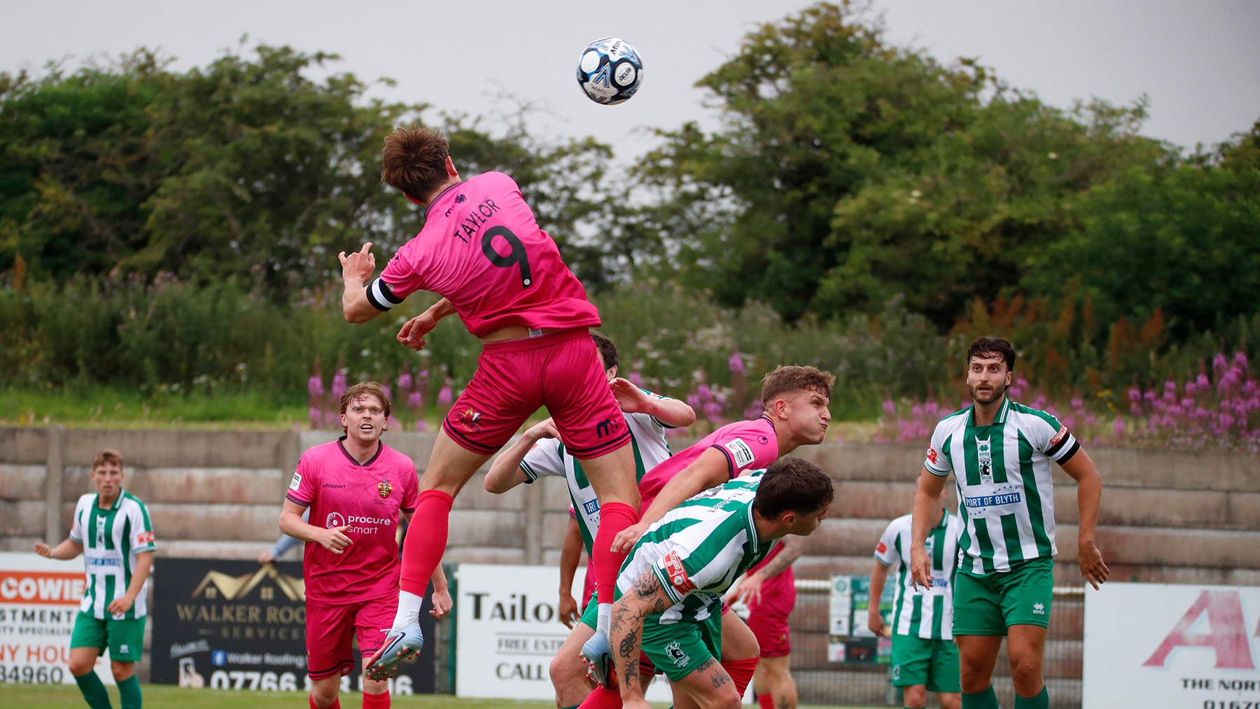 Spennymoor Town striker Glen Taylor heads home a goal against Blyth Spartans